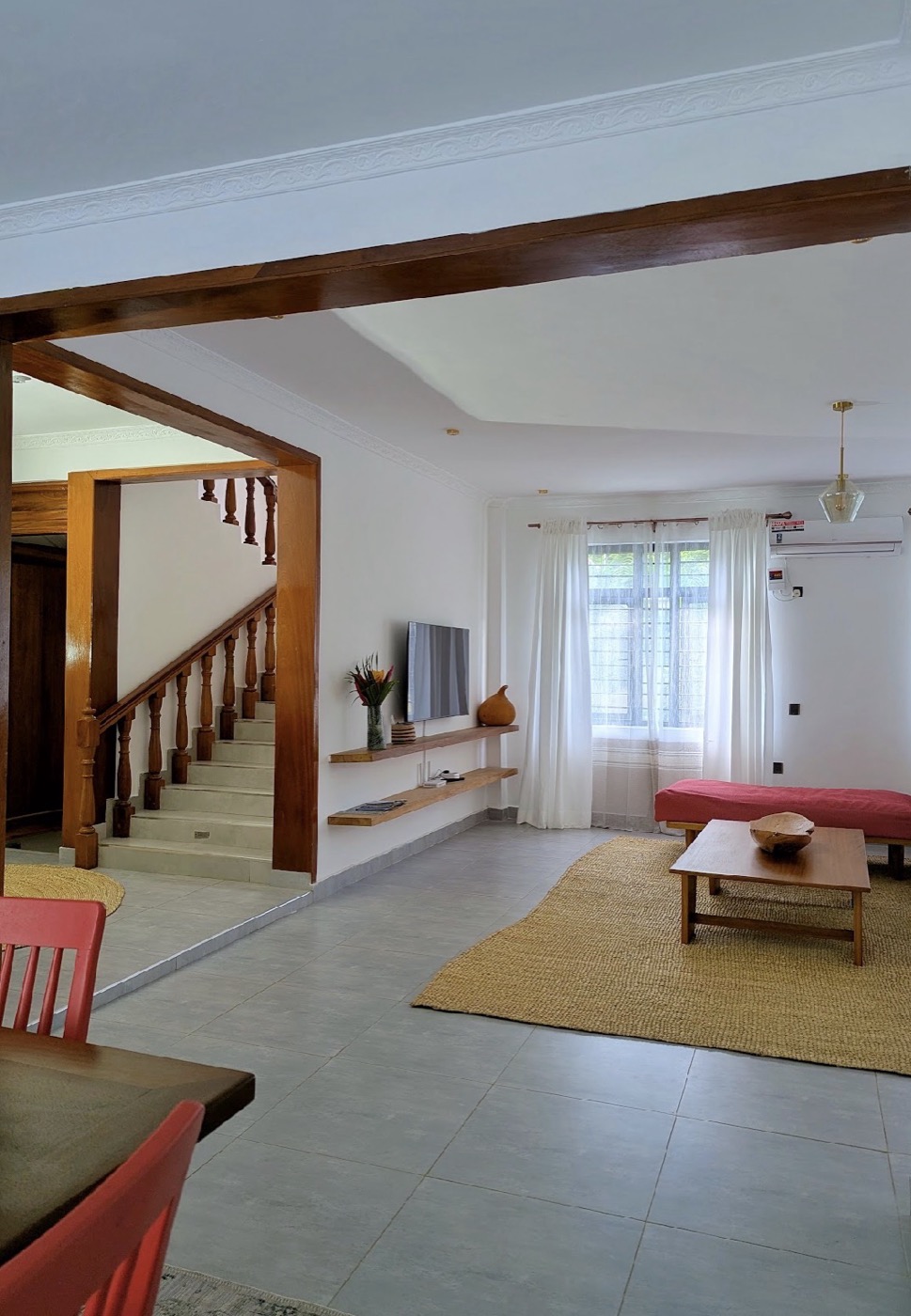 The dining area opening to the living room