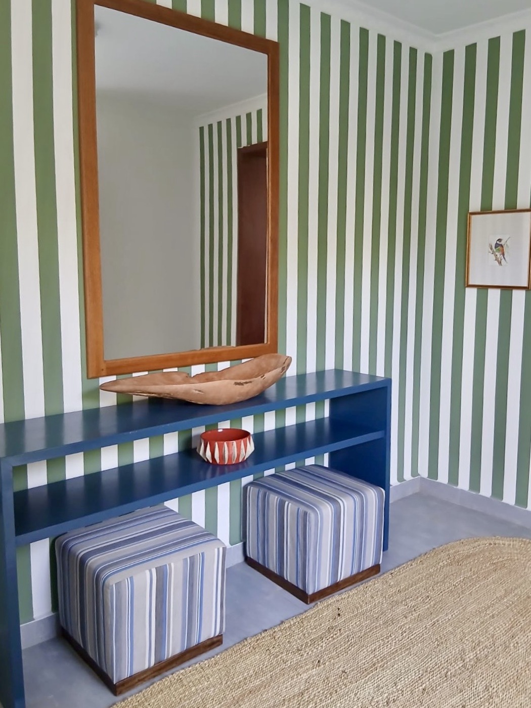 The green-striped dressing room with its blue console