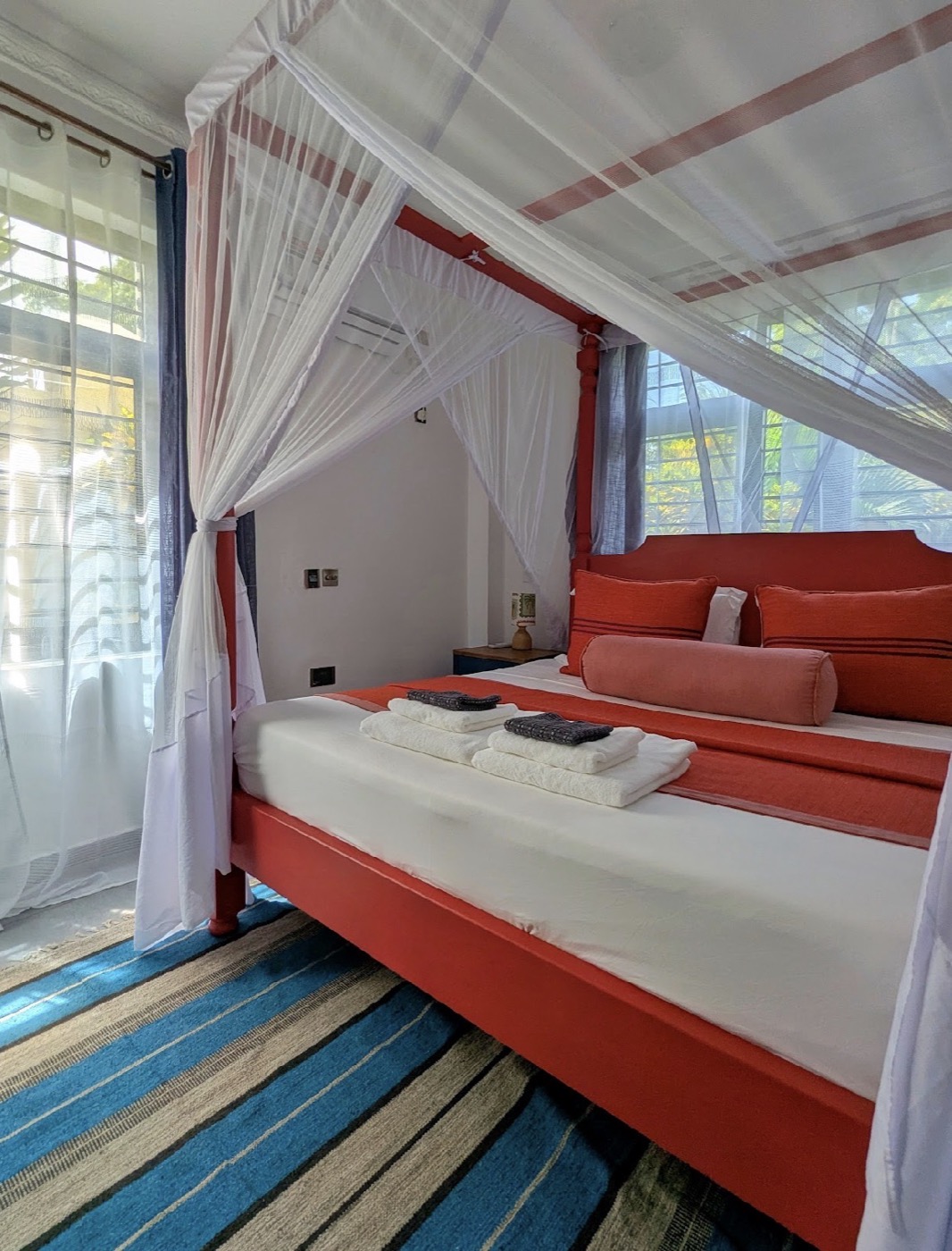 The coral ground-floor king bedroom