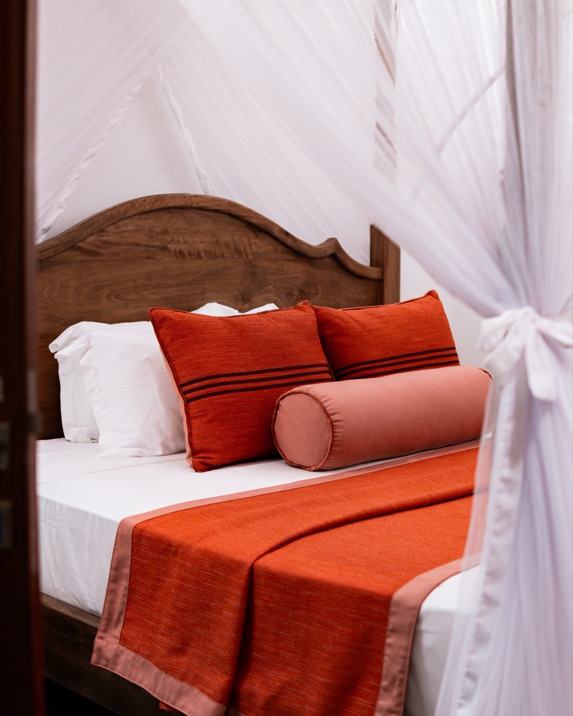 Four-poster bed with canopy nets