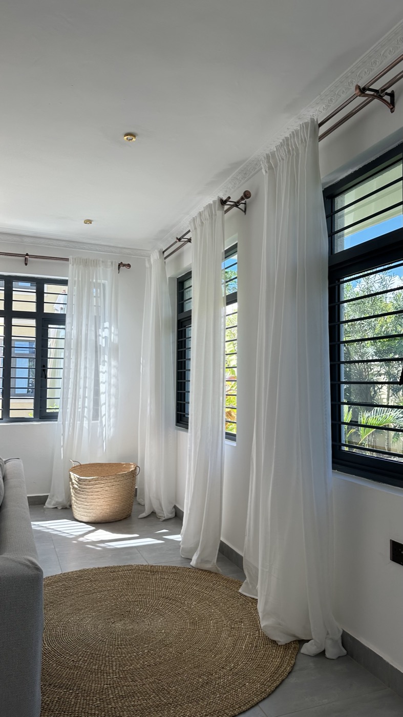 Bright lounge with sheer curtains
