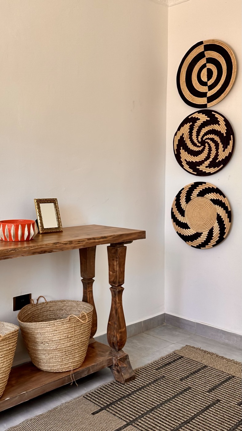 Woven basket plates above the console